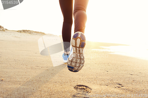 Image of Beautiful woman running