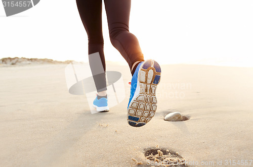 Image of Beautiful woman running