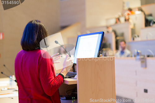 Image of Female speaker at Business Conference.