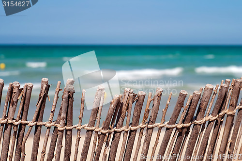Image of Short of a fence at the beach