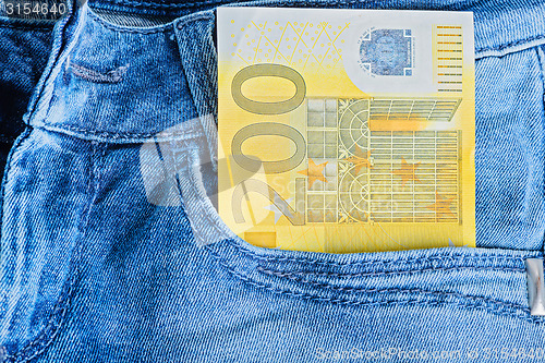 Image of 200 Euro in a jeans pocket