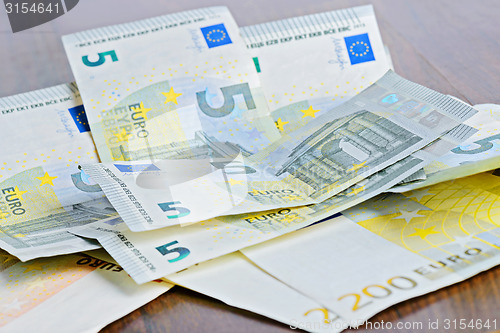 Image of Close-up of 5 Euro banknotes