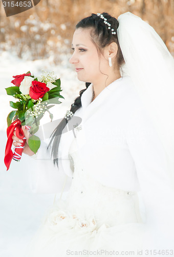 Image of wedding dress and flowers veil