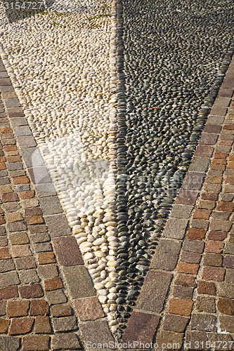 Image of near mozzate  abstract   pavement of a curch   wall marble