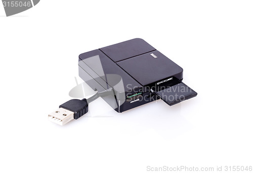 Image of SD card and reader on white 