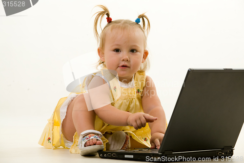 Image of Baby with laptop