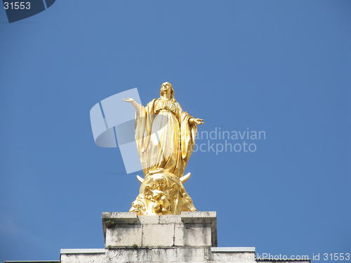 Image of Maria in gold