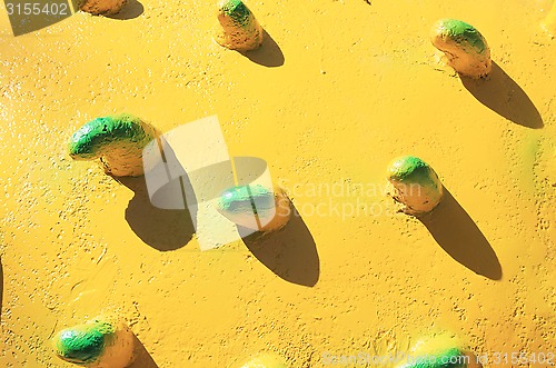 Image of yellow old decorative wall stucco