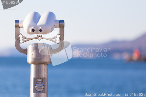 Image of Telescope on a shore.