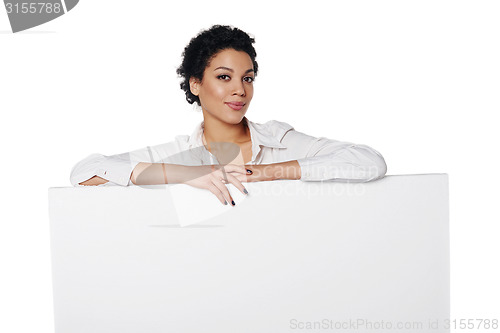 Image of Business woman showing blank credit card