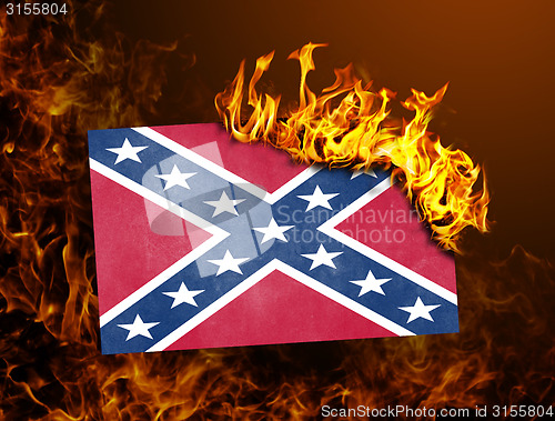 Image of Flag burning - Confederate flag