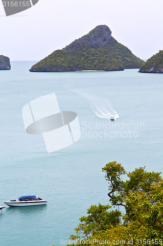 Image of  boat coastline of a  green lagoon  china sea thailand kho phang