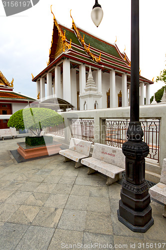 Image of  pavement gold    temple   in   bangkok  street lamp