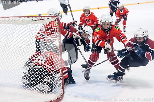 Image of Game of children ice-hockey teams