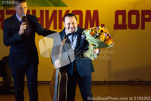 Image of Igor Sarukhanov with a flowers