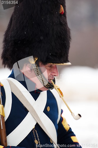 Image of Smoking russian musketeer