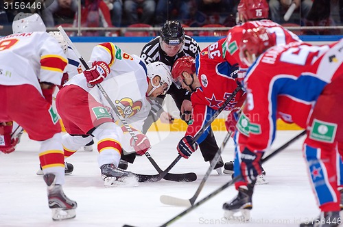 Image of P. Virtanen (26) and J. Murshak (74) on faceoff