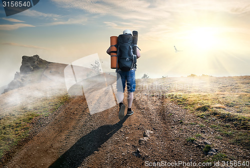 Image of Climbing tourist