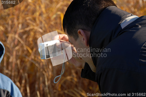 Image of man doing photo