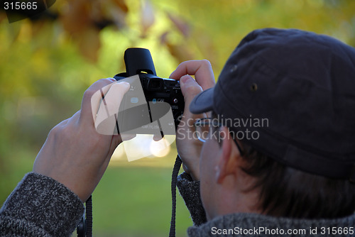 Image of man doing photo