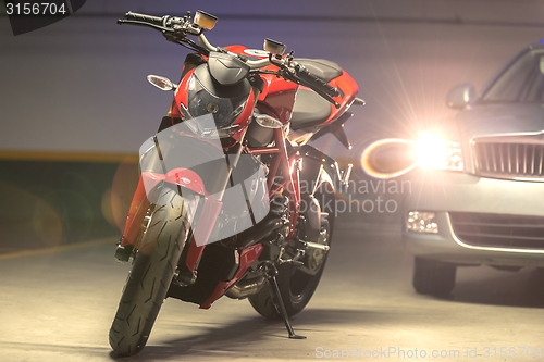 Image of Motorcycle parking in garage
