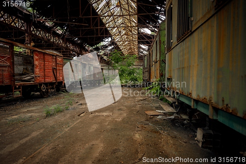 Image of Cargo trains in old train depot