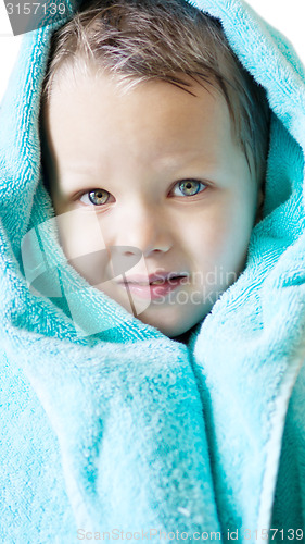 Image of boy with towel