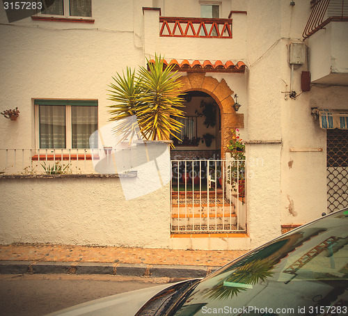 Image of Tossa de Mar, Spain, ancient town street at summer day