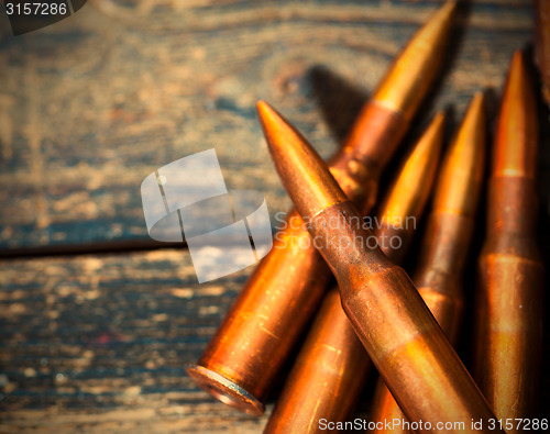 Image of Still life with five rifle cartridges