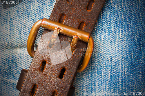 Image of vintage leather belt with buckle