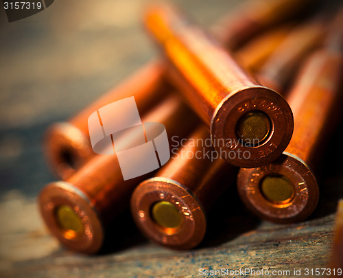 Image of Still life with five rifle cartridges