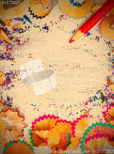 Image of multicolored pencil shavings and copy space