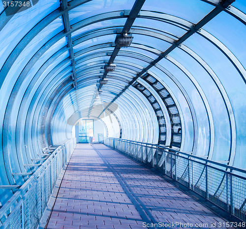 Image of blue air pedestrian tunnel
