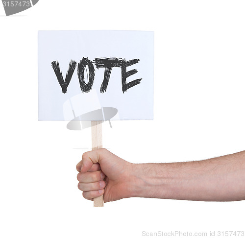 Image of Hand holding sign, isolated on white