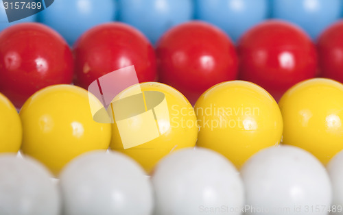 Image of Close up of an old colorful abacus, selective focus