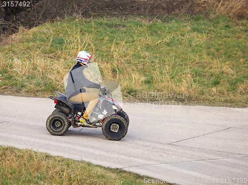 Image of Young man on a quad