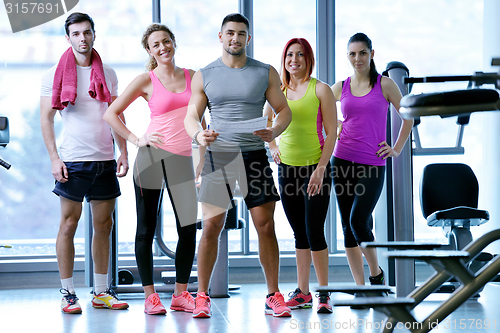 Image of Group of people exercising at the gym