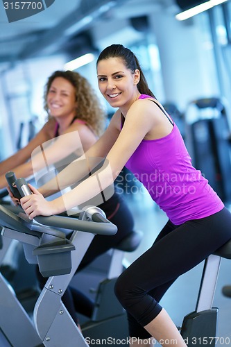 Image of Group of people running on treadmills