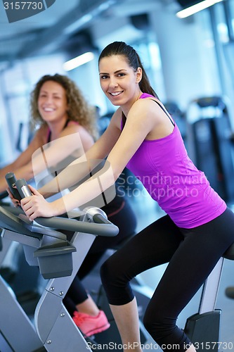 Image of Group of people running on treadmills