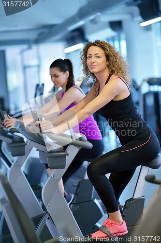 Image of Group of people running on treadmills