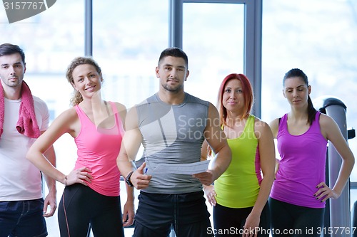 Image of Group of people exercising at the gym