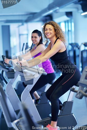 Image of Group of people running on treadmills