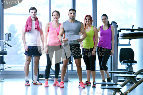 Image of Group of people exercising at the gym