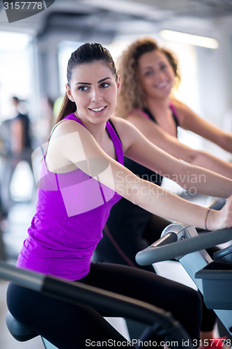 Image of Group of people running on treadmills