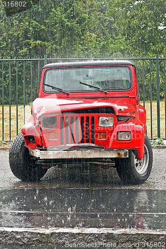 Image of Red crashed SUV