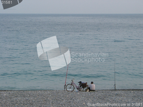 Image of Fisherman at the sea.