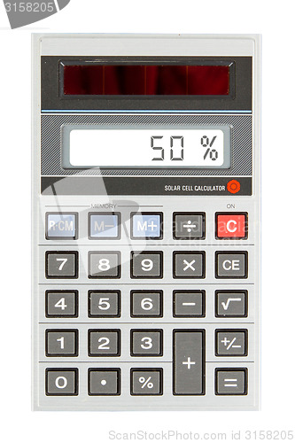 Image of Old calculator showing a percentage - 50 percent