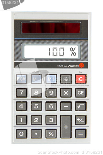 Image of Old calculator showing a percentage - 100 percent