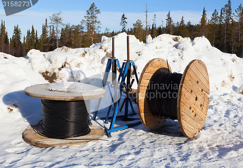 Image of cable drums in the snow