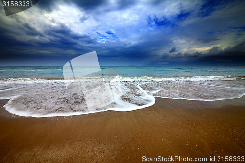 Image of Sea beach and storm clouds